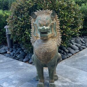 Majestic Green and Brown Lion Statue